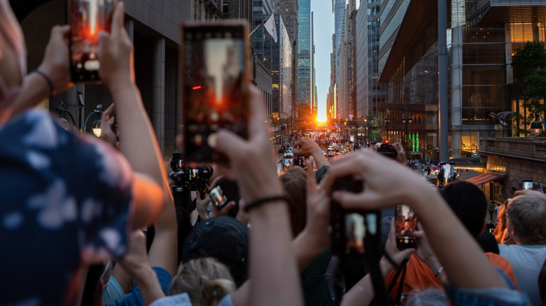 Crowds photographing Manhattanhenge