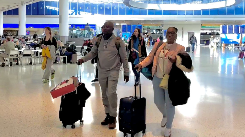 Passengers walking through JFK