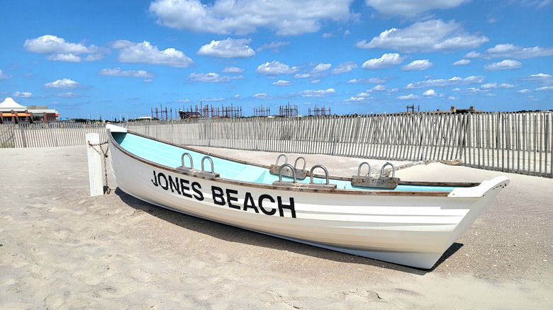 View of a boat on white sand at Jones Beach State Park, Long Island