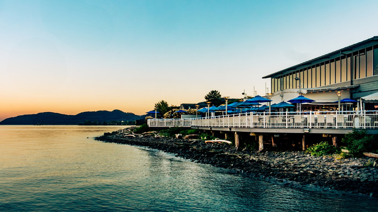 The patio at the Hudson Water Club is lively in warm weather