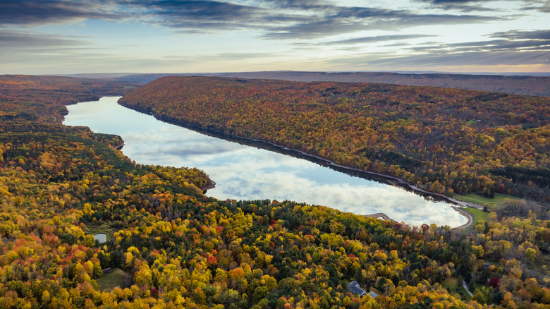 Candace Lake surrounded by fall foliage in New York