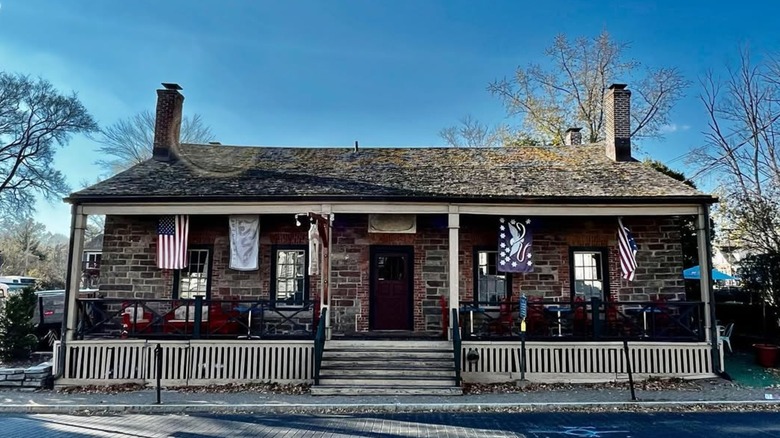 The facade of the '76 House on a sunny day