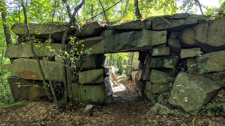 Trail going under a stone arch at the Sylvan Glen Park Preserve in Yorktown, New York