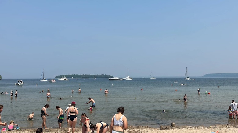 People enjoying Nicolet Beach in summer