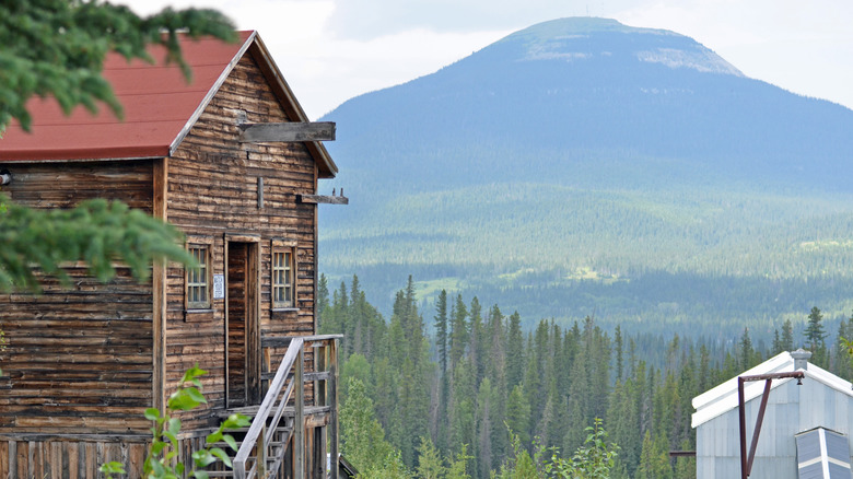 Old mine buildings in Nordegg, Alberta, with mountain views in the background