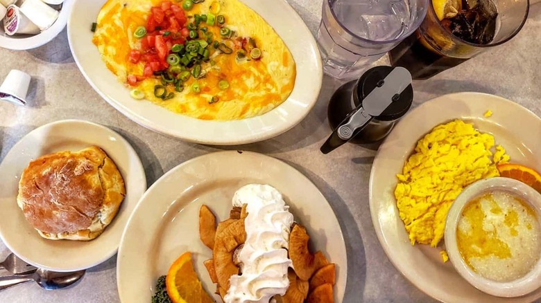 A table full of breakfast dishes at Elmo's Diner in Durham, North Carolina