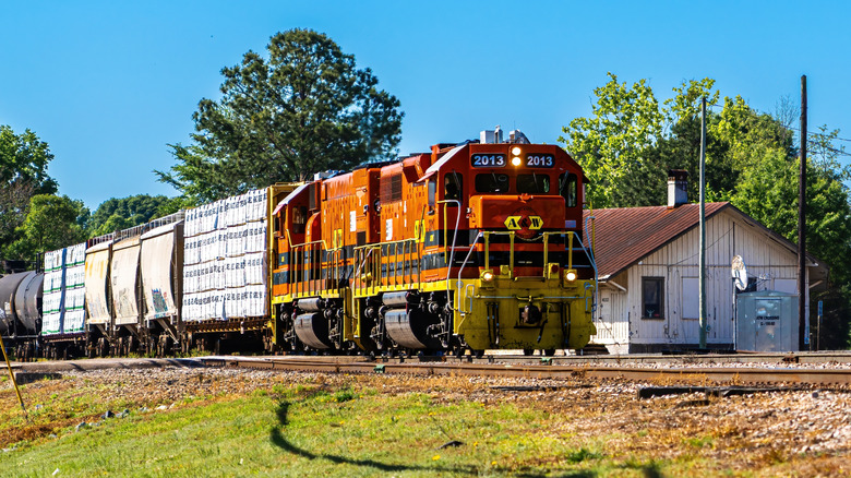 A modern train moves down the historic line in Sanford, North Carolina