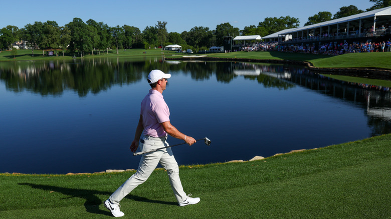 Rory McIlroy walking on the grounds at Quail Hollow