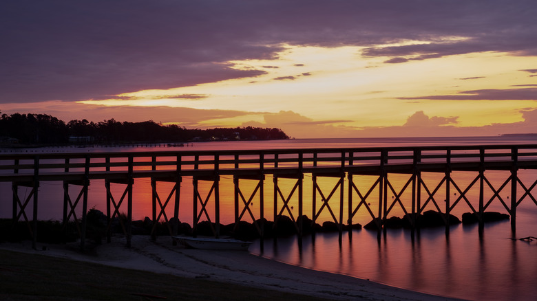 View of sunrise over the water from a park in Minnesott Beach.
