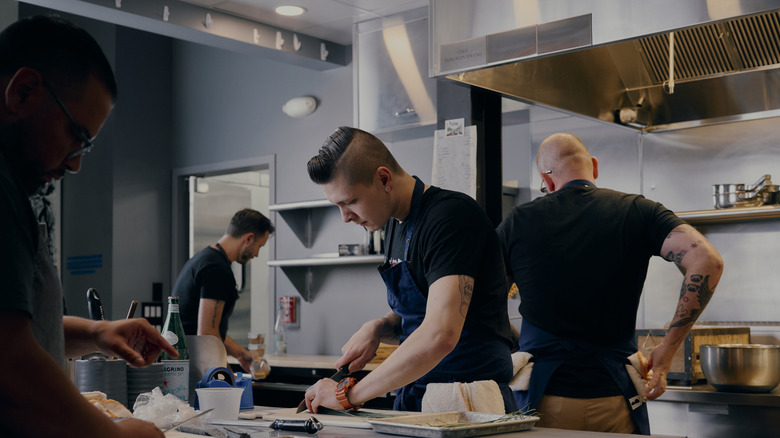 Four chefs working in the kitchen at Counter-