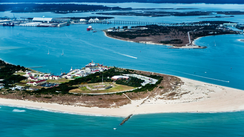 an aerial view of the beaches and ocean surrounding Fort Macon, a Civil War-era fort in North Carolina