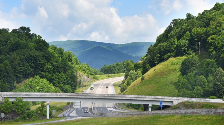 Lush green hills surround I-26 in North Carolina
