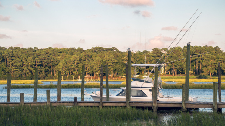 Boat at a dock on the marsh near Calabash, North Carolina