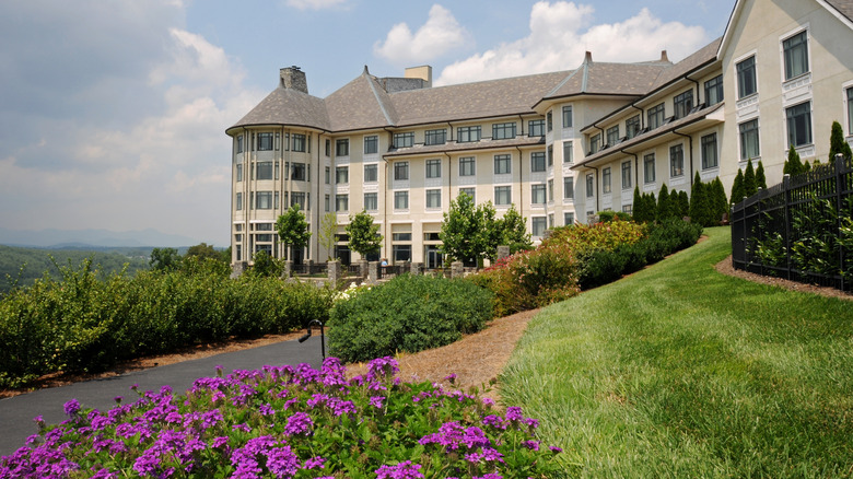 Exterior of The Inn on Biltmore Estate and a garden walkway