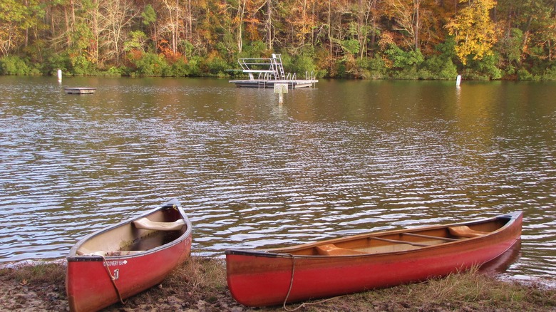 Two canoes beached at cliffs of the neuse state park
