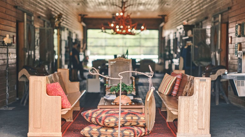 The waiting area at The Stable Spa, with treatment rooms in private stable sections