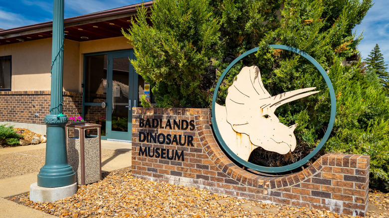 Entrance sign outside of the Badlands Dinosaur Museum in Dickinson, North Dakota