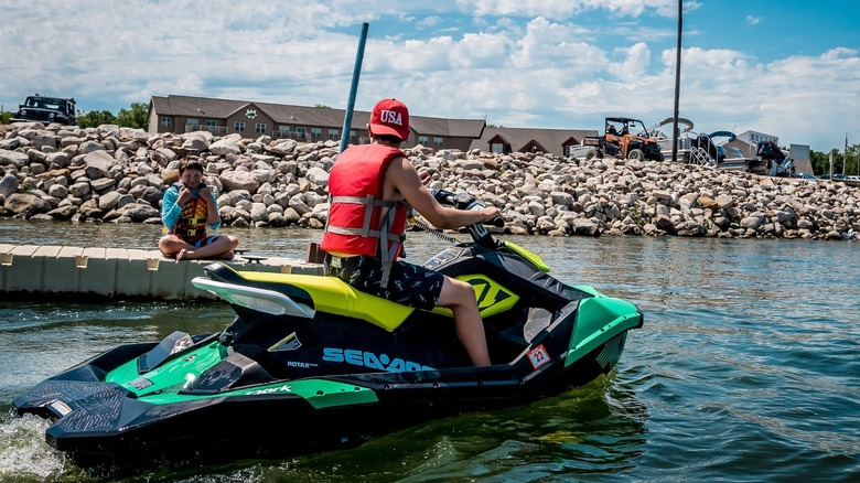 man on a jetski near a dock at Devils Lake, ND