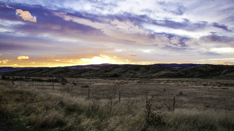 Sunset over hills in Omak, Washington