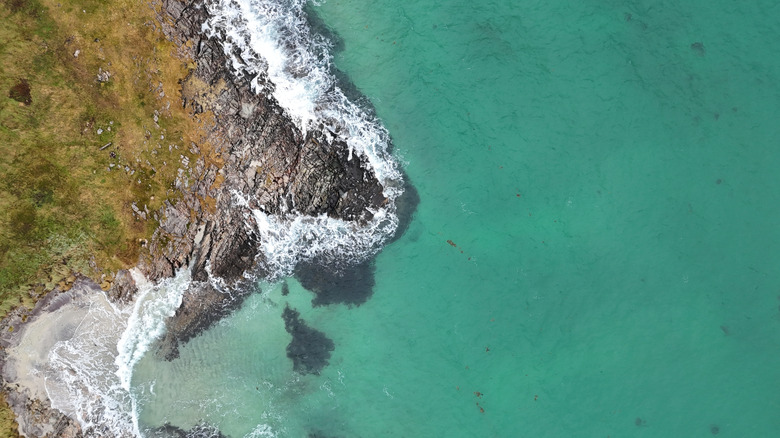 Aerial view of Sommarøy's turquoise waters and sandy beaches