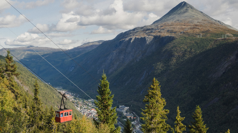 The aerial tramway in Rjukan, Norway against an alpine backdrop