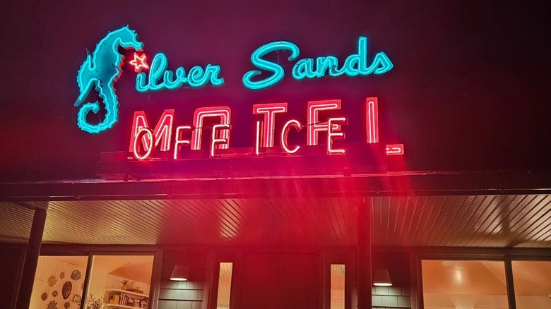 Neon sign outside Silver Sands Motel
