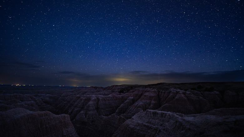 stars over rock formations of Badlands National Park in South Dakota
