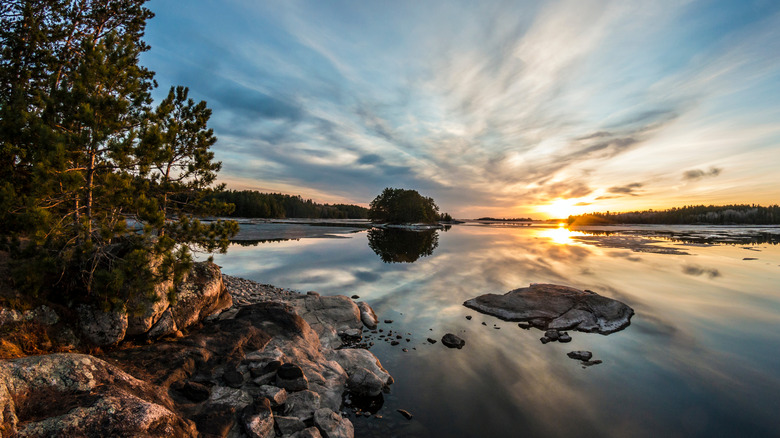 Sunset over the water in Voyageurs National Park behind the Ash River Visitor Center