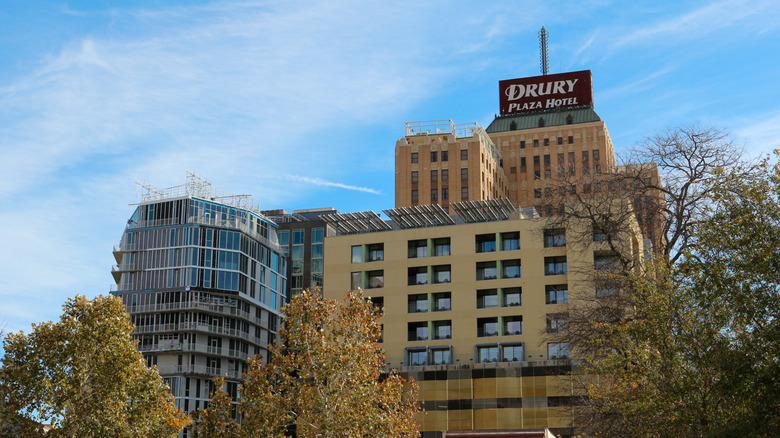 Drury Plaza Hotel San Antonio rising above trees