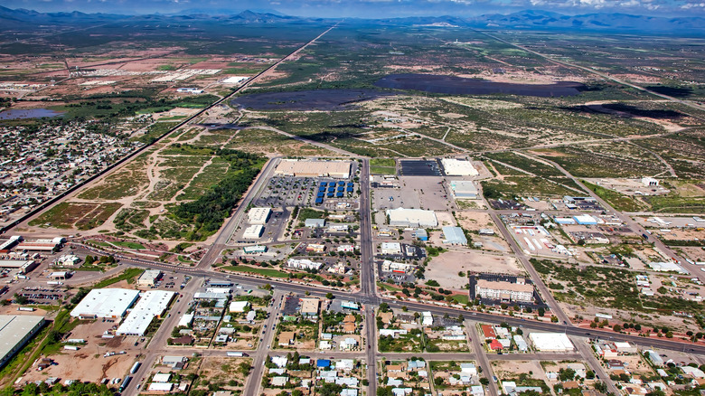 Aerial view of Douglas homes and streets beside the Mexican border.