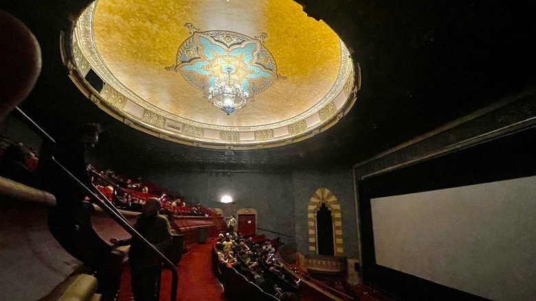 The ornate, gilded ceiling of the Village East Cinema in New York