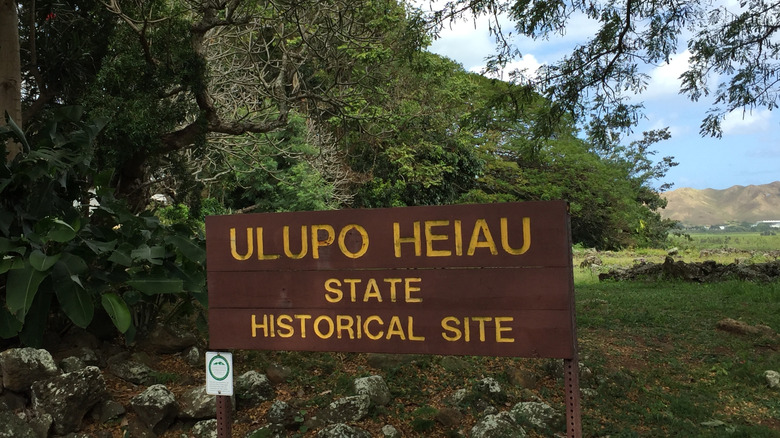 The wooden sign announcing the entrance to the historic site