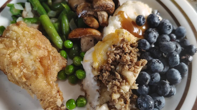 Buffet plate with fried chicken, sides, and dessert at Dutchman's Diner