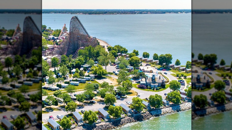 An overhead view of Lighthouse Point Campground at Cedar Rapids Amusement Park with campers and a rollercoaster in view.