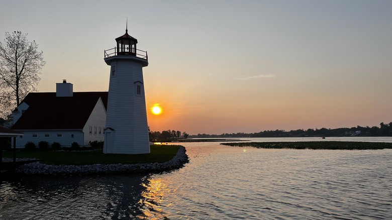 Lighthouse and cabin on Buckeye Lake at sunset
