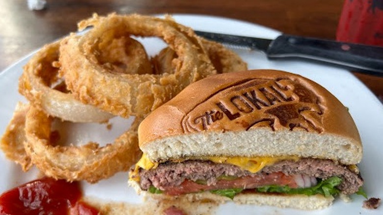 Burger and onion rings at The Lokal