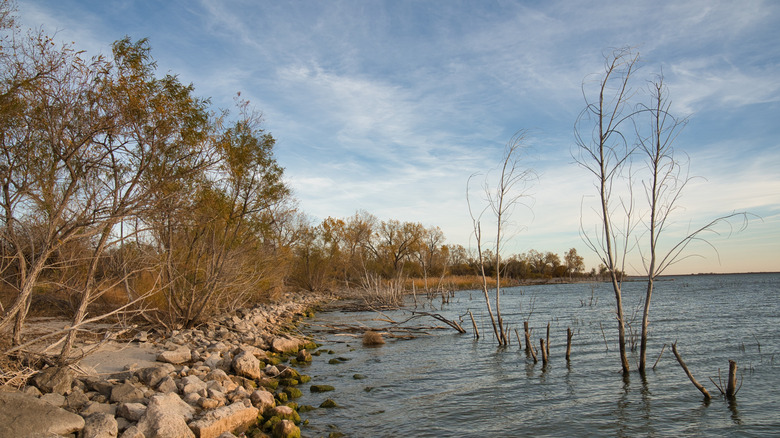 Rip-rap shoreline along the edge of Canton Lake