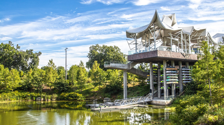 Abstract white-roofed structure that makes up part of Gathering Place, a playground by Zink Lake and the Arkansas River, part of Tulsa, Oklahoma's River Parks system