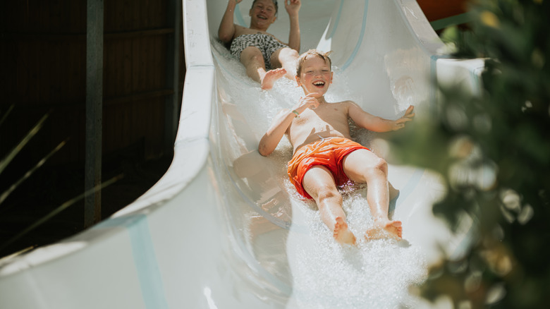 Kids on a water slide