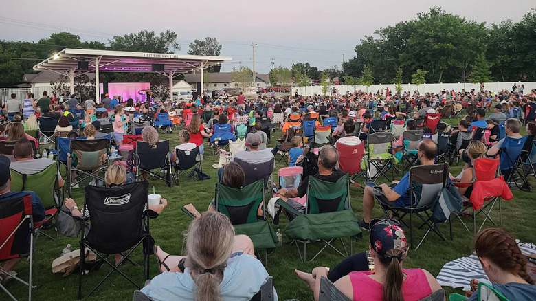 Crowd enjoying a live show at Redbud Festival Park in Owasso, Oklahoma