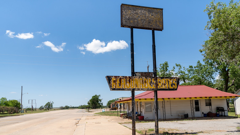 Rundown building and deserted road in Texola, Oklahoma