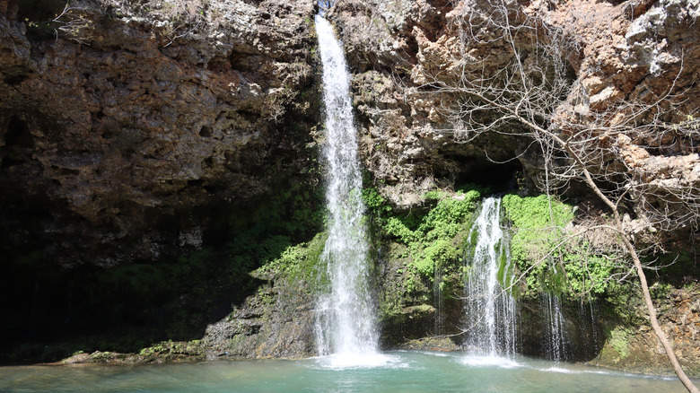 Waterfall at Natural Falls State Park in Oklahoma, plunging around 77 feet into a shallow pool