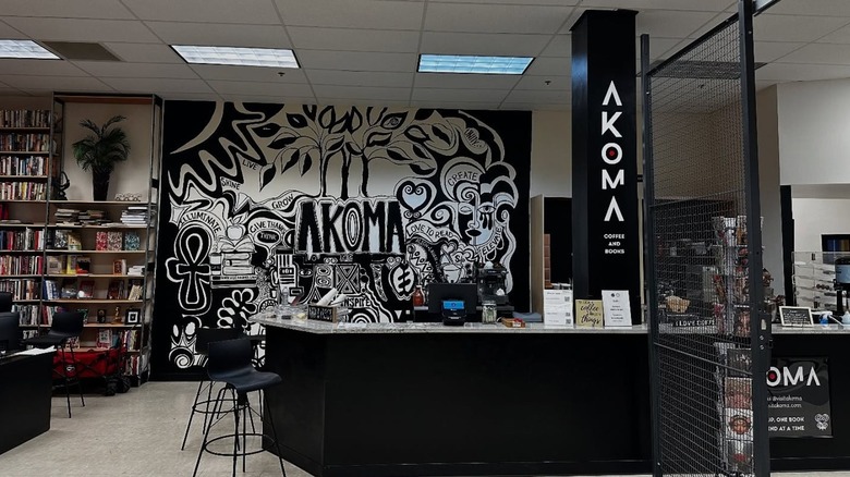 Interior of Akoma bookstore with monochrome art and desk