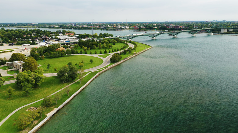 The grassy banks of Fort Erie with a view across the water to Buffalo, New York