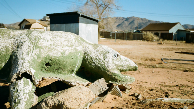 Dilapidating dinosaurs in a ruined mini golf park in Apple Valley