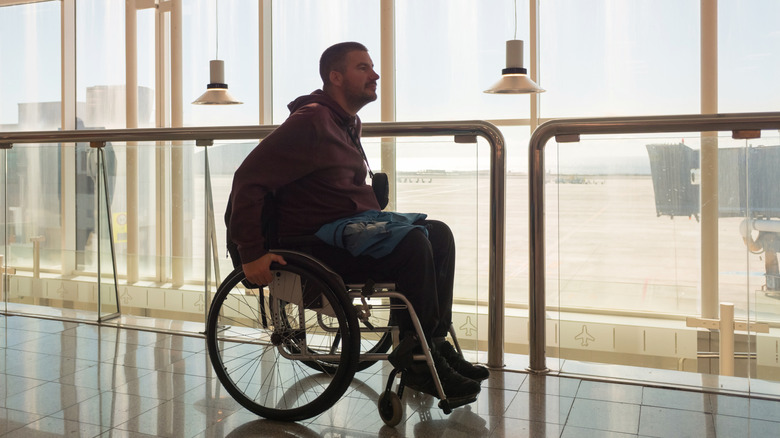A traveler with a wheelchair at the airport