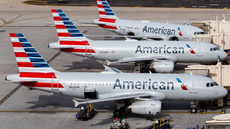 Three American Airlines planes on tarmac