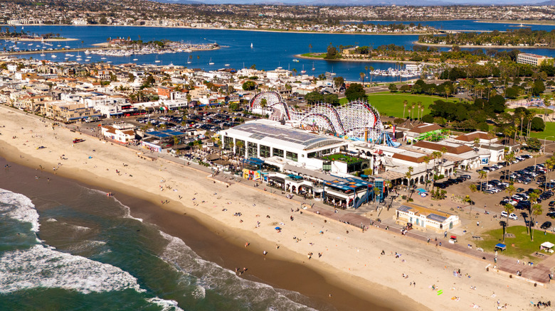An aerial view of the beachfront Belmont Park amusement park in San Diego