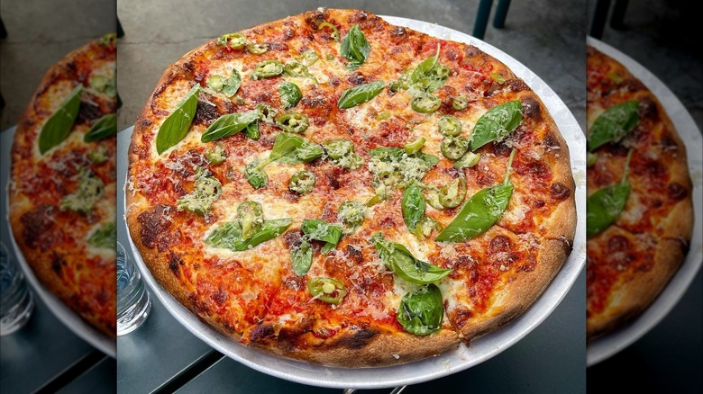 Basil and jalapeños on pizza at Pizzeria Beddia