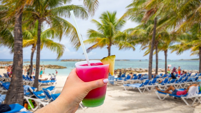 Palm trees with tropical cocktail